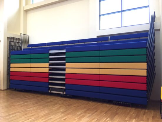 Multicoloured retractable bench, in a closed position