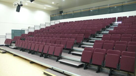 Maroon coloured FD200 retractable seating