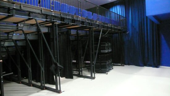 The rear view of a retractable seating system